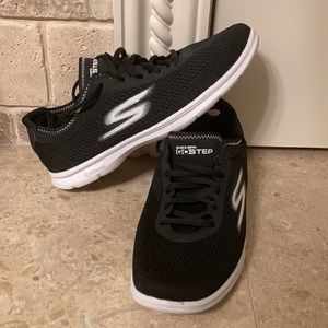 Women’s Black 8 1/2 breathable Skechers go Step sneakers.